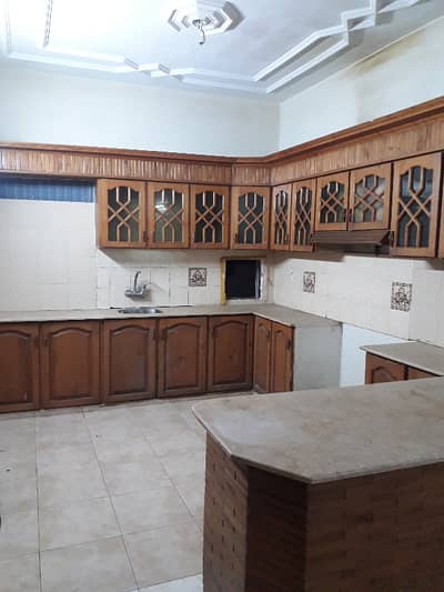 three bed dd tiled flooring portion for rent in johar