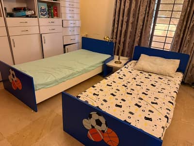 interwood beds with side table