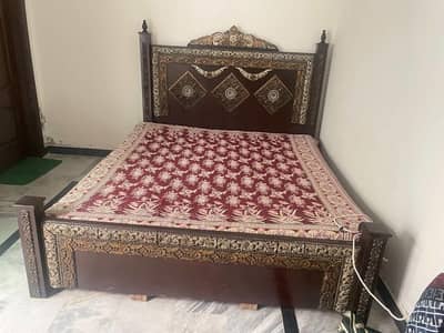 Full size wooden bed with mattress