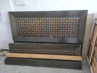Used double bed along with two side tables and mattress