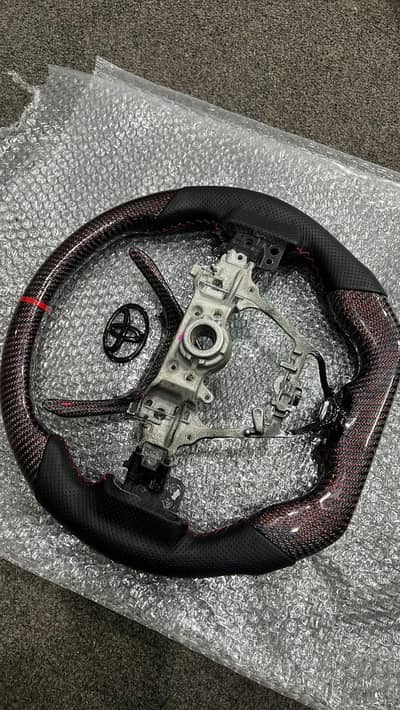 Grande Red Carbon Fiber steering wheel