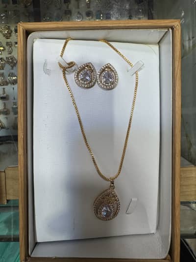 Locket and earings