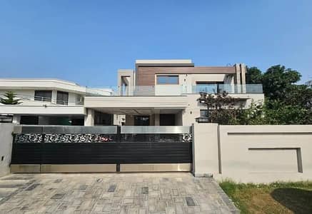 One Kanal Brand New Luxury Ultra-Modern Design Most Beautiful Bungalow 2 Servant Quarter In Basement For Sale At Prime Location Of DHA Lahore Near To Park Masjid & Commercial Market.