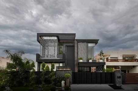 One Kanal Brand New Luxury Ultra-Modern Design Most Beautiful Fully Furnished Bungalow 2 Servant Quarter In Basement For Sale At Prime Location Of DHA Lahore Near To Park Masjid & Commercial Market.