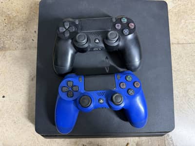 PlayStation 4 | PS4 slim 500GB with 2 original controllers and 5 games
