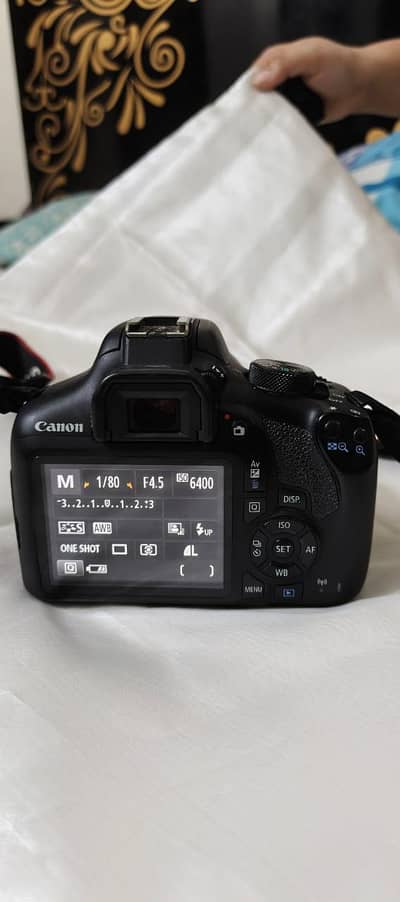 Canon 1300D + 18-55mm used Rs. 45,000