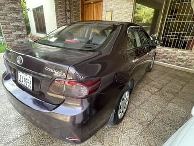 Toyota Corolla GLI 2012 Total Genuine Red Wine Color