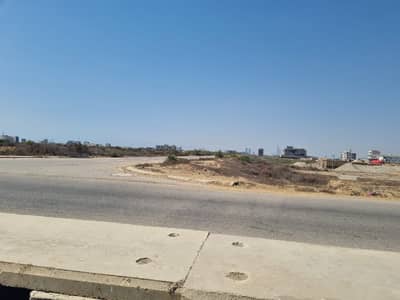 HIGH-YIELD INVESTMENT: 125 SQ YD PRIME RESIDENTIAL PLOT FOR SALE IN DHA CITY KARACHI (DCK), SECTOR 13-F