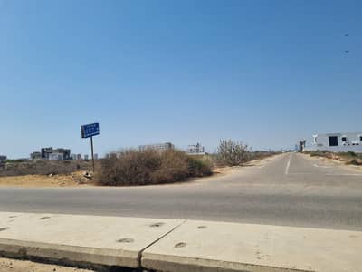 HIGH-YIELD INVESTMENT: 125 SQ YD PRIME RESIDENTIAL PLOT FOR SALE IN DHA CITY KARACHI (DCK), SECTOR 9-E