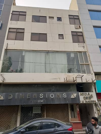INVESTMENT OPPORTUNITY: 200 SQ YD COMMERCIAL BUILDING FOR SALE ON KHAYABAN-E-TANZEEM, TAUHEED COMMERCIAL, DHA PHASE 5, KARACHI