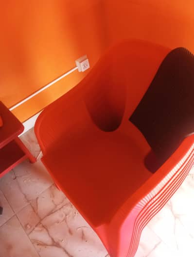 Boss plastic chair and table for sale.