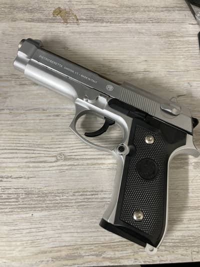 Gun with metal bullets
