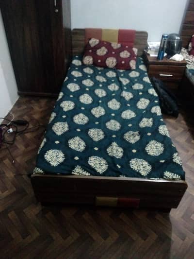 Used Single Wooden bed