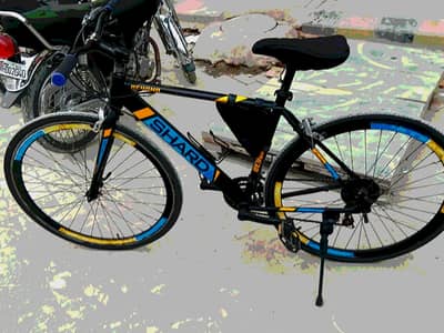 SHARD beyond (road bike) and (hybird).