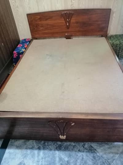 used double bed queen size wooden without side tables urgent sale