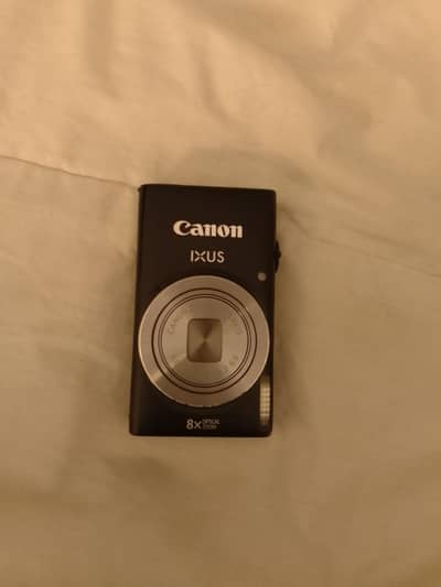 original canon ixus digital camera + authentic leather case