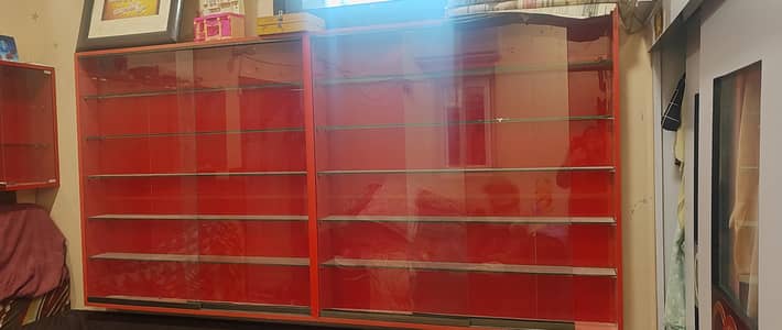 showcase aclyric rack with sliding glass door