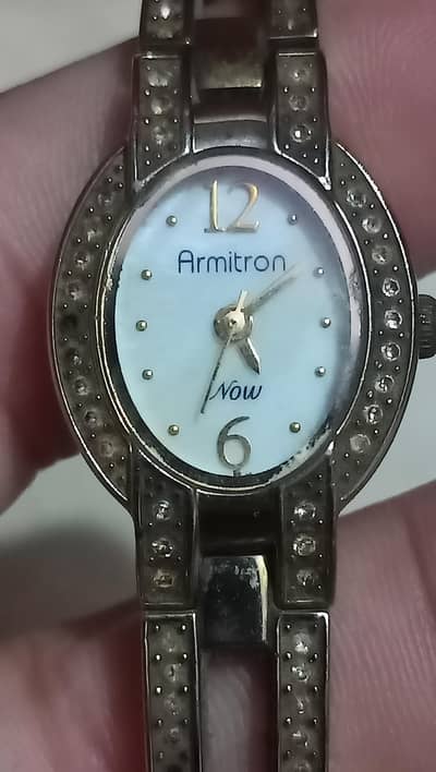 Armitron Now original merican Ladies  watch gold plated gemstone bezel
