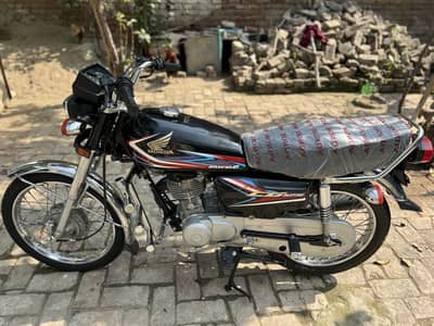 Honda cg 125  2019 model very good condition number punjab smart card