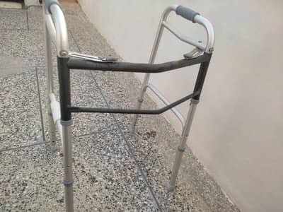 a walker in fine condition for elderly people.
