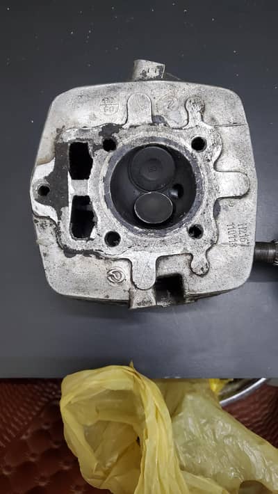 head and cylinder 125