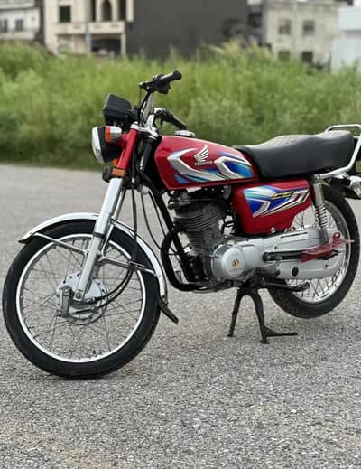 Honda 125 lush condition Islamabad nmbr