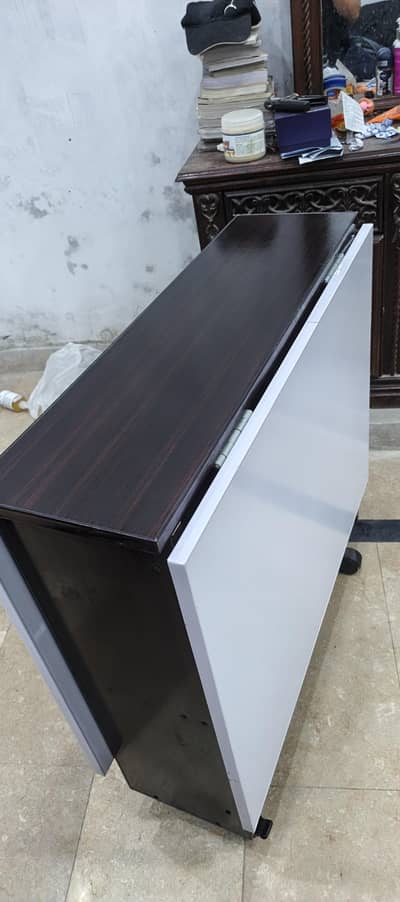 Folding dining table