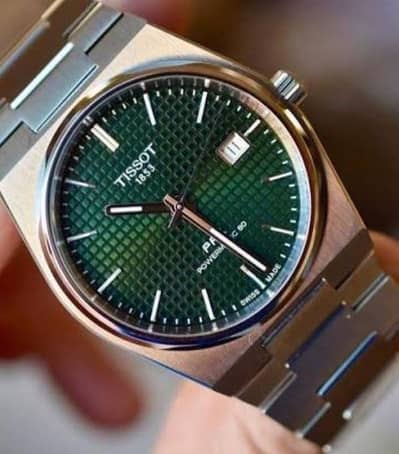 Tissot green frame watch is for sale