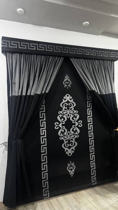 Black and grey curtain with blind