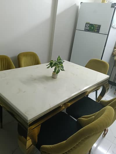full essence dinning table with imported marbel with 6 chairs