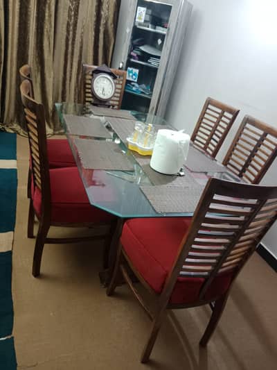 Affordable wooden dining table with glass top and set of six chairs