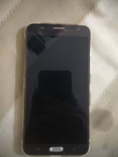 Samsung Mobile J7 with cover