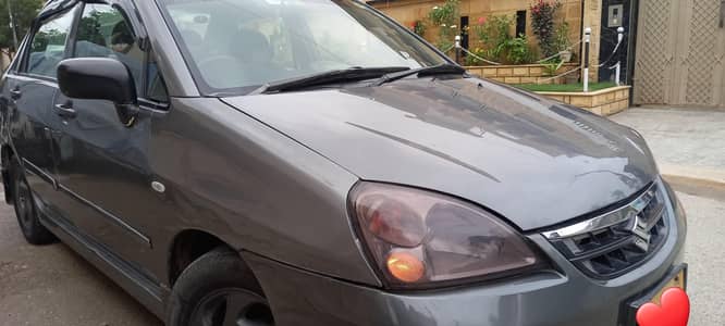 Suzuki Liana Rxi 2012 osam condition btr than alto cultus mahran coure