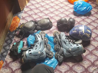 Rollerblade skates with safety kit for 12 yrs