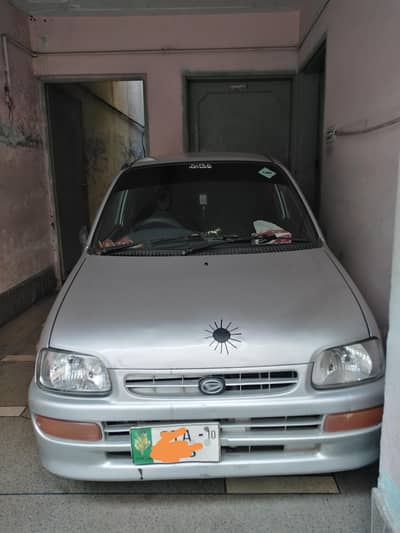 Daihatsu Cuore 2009. last month. a new car. all original condition
