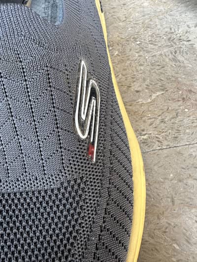 casual sneaker featuring an EU size "44"