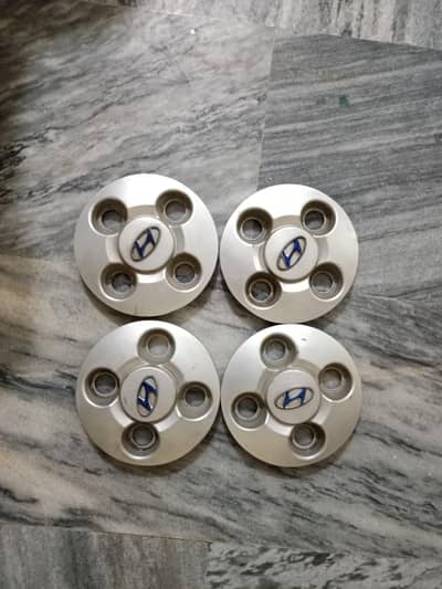 Hyundai santro Half wheel covers.