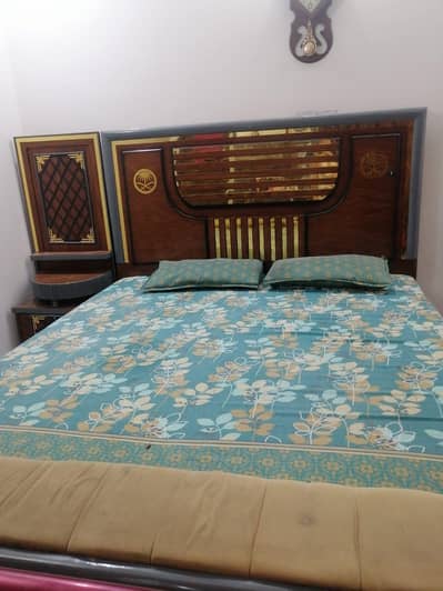 Bed with side table