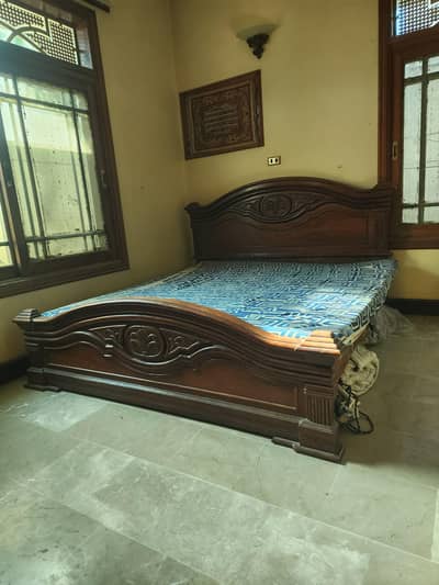 king size bed with dressing table and side tables