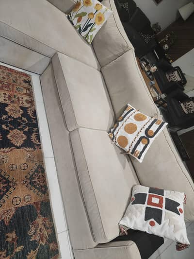 L shaped interwood sofa