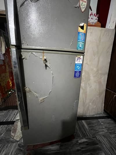 Old Fridge Needs Repair
