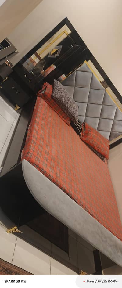 One King Sized Bed With One Dressing And Two Sidecorners