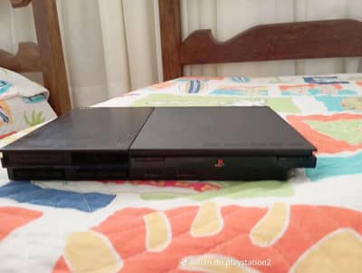 ps2 slim ha leke rkh dia hua tha bhot kam use ha