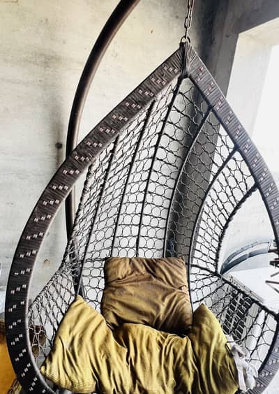 Hanging chair with stand and cushions
