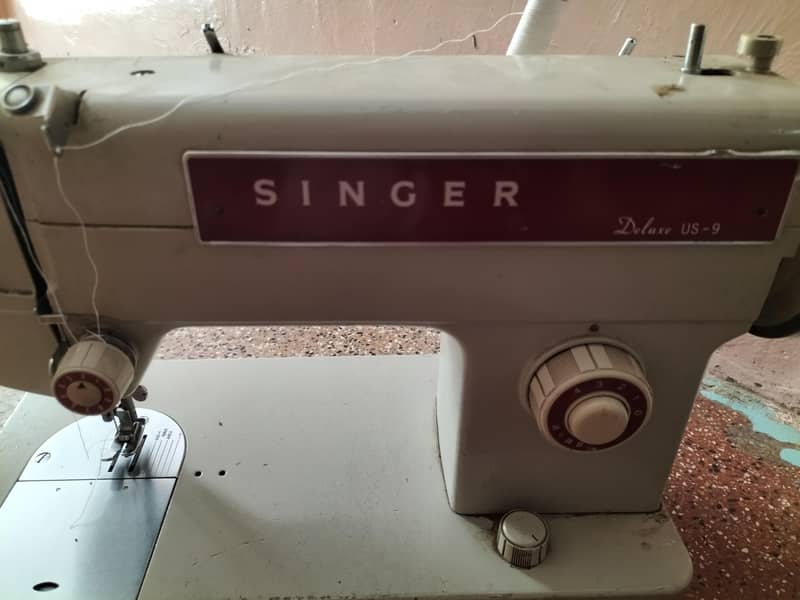 singer machine 1