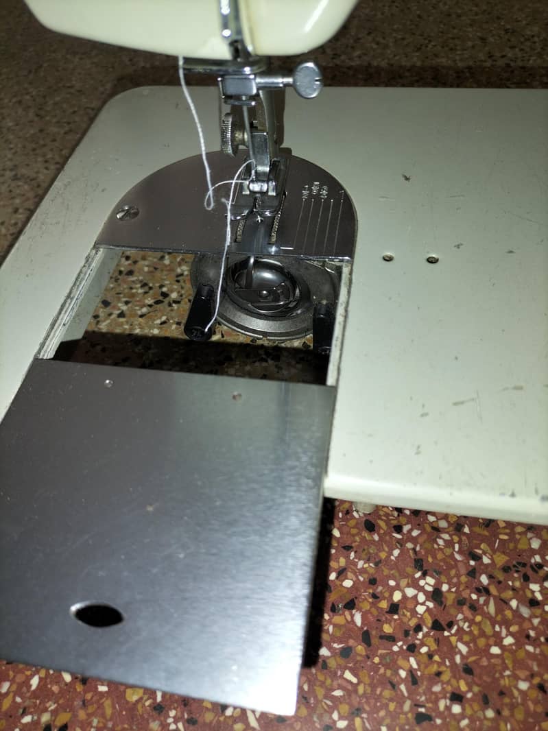 singer machine 3