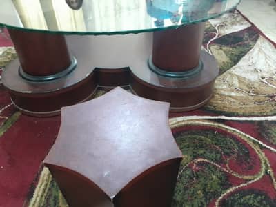Center table. . . wooden table with 4 wooden stools n thick glass top d