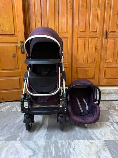 Imported stroller plus carry coat is available for sale