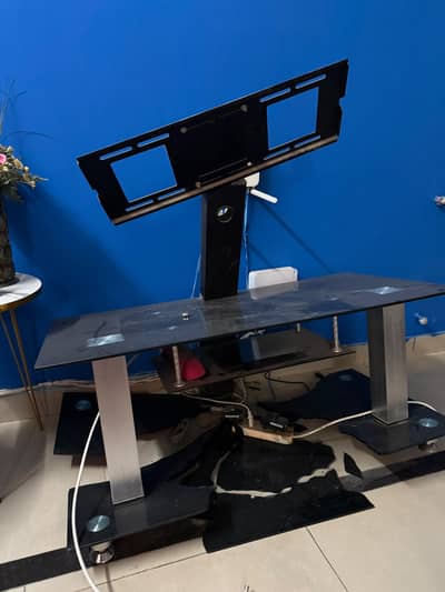 TV table with broken glass