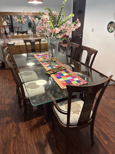 Sheshum glass top dinning table